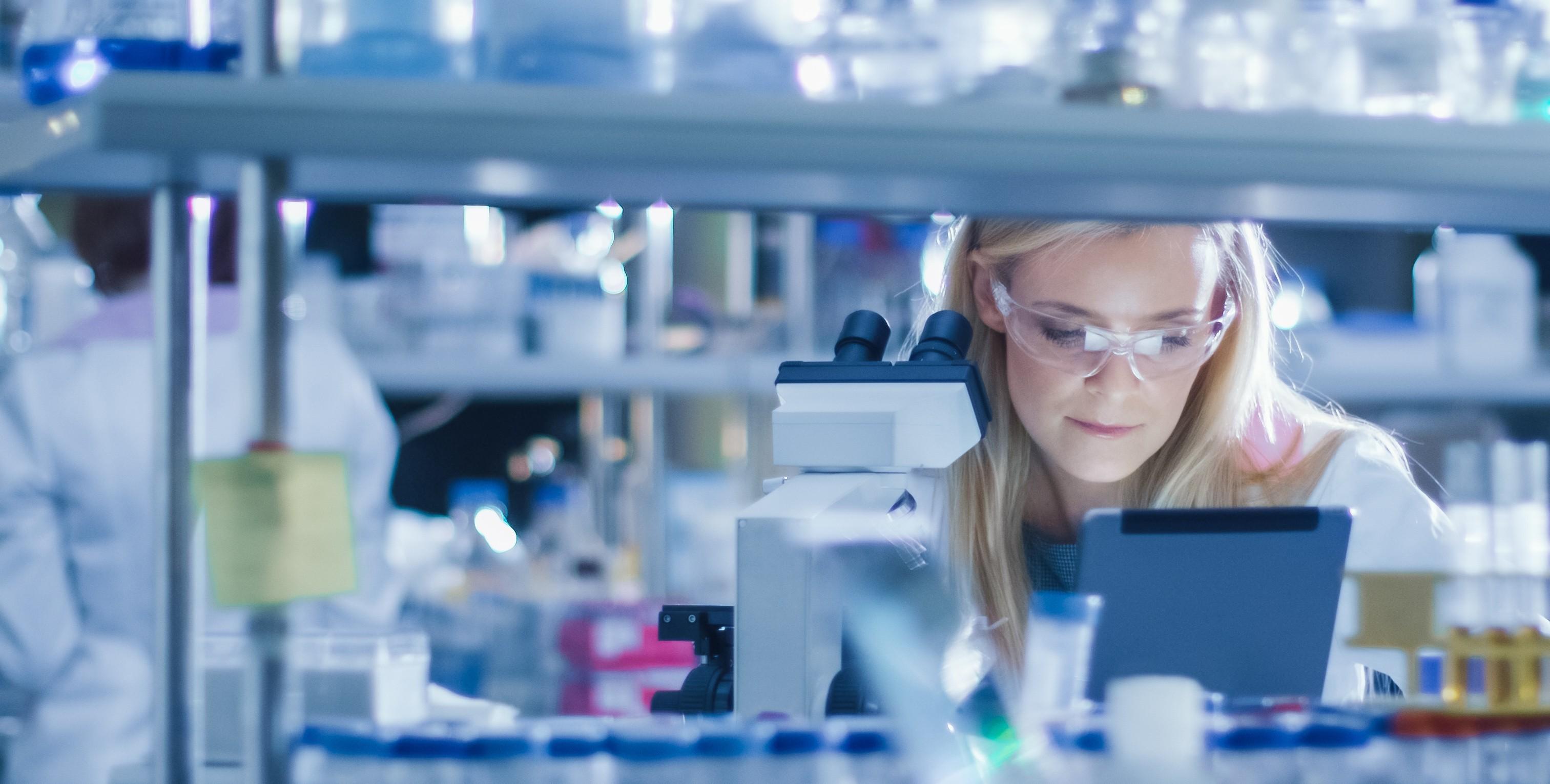Scientist in lab background